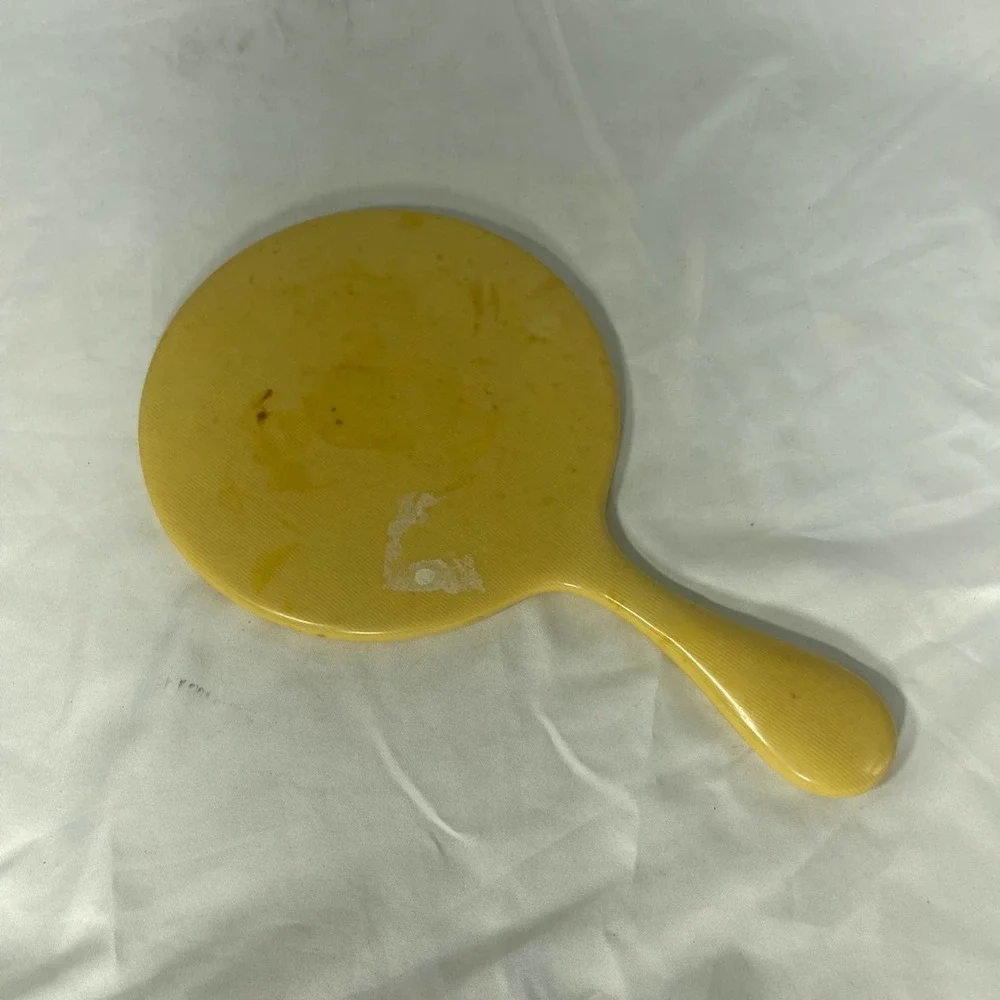 Vintage Bakelite hand held mirror